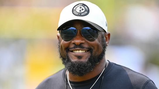 Mike Tomlin smiles at the Steelers' training camp practice Tuesday in Latrobe, Pa.